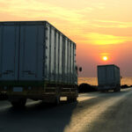 truck on highway road with container logistic industrial with sunrise sky